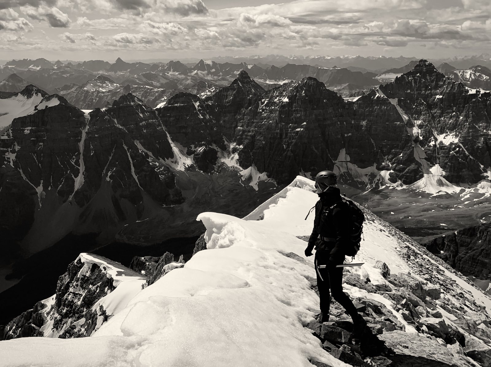Matthew Link on a snowy summit ridge in the Rockies